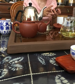 Ethical Travel is sharing a story over Tea at a small tea house in Beijing